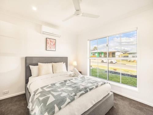 Greenbank House | Modern Family Retreat in Premier GreenbankLocation