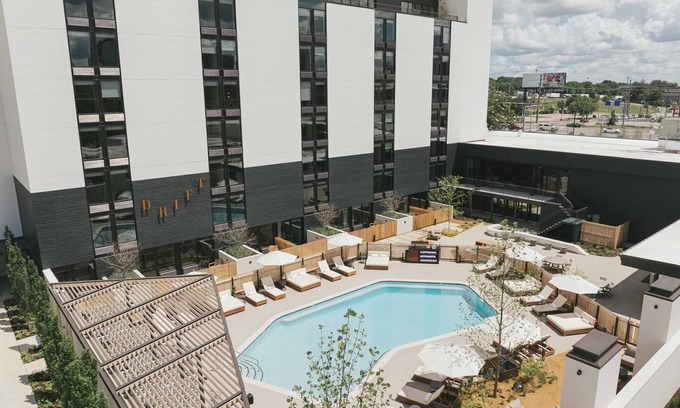 East Bank Hotel | Modern Hideaway with Rooftop Lounge, Pool, Firepits & City Views