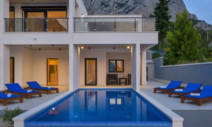 Bast House | Modern holiday home with infinity pool, three bedrooms, terrace, sea view