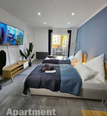 Moers Apartment | Modern Homes - Voll ausgestatte Wohnung - Balkon - Hotelbetten - 4K TV - WLAN