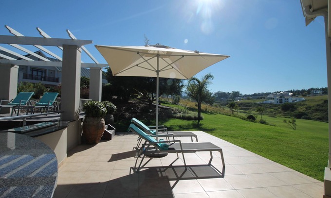 George House | Modern house, solar-heated pool & stunning views, at Kingswood Golf Resort