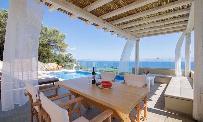 Agia Pelagia Chlomou Villa | Modern Seafront Villa, A/C, Private Pool, Amazing Sea Views & Beautiful Sunrises - 60m from the Sea!
