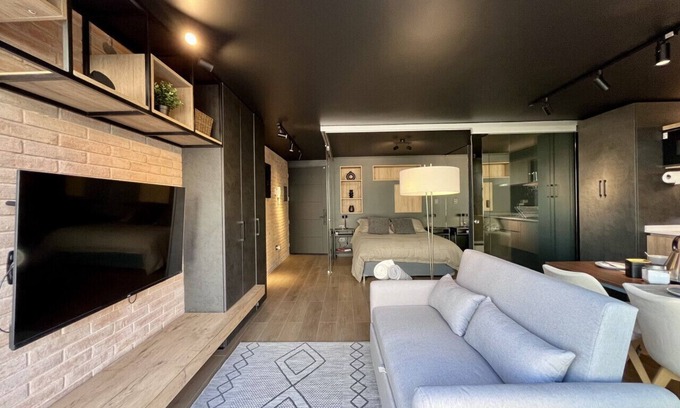 Downtown Santiago Apartment | Modern Studio Apartment, Terrace & Workspace with Panoramic Views