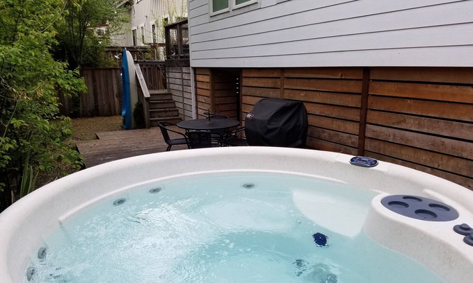 Vacation Beach House | Modern Vacation Beach Gem by the River w/Hot Tub - 4 queen beds