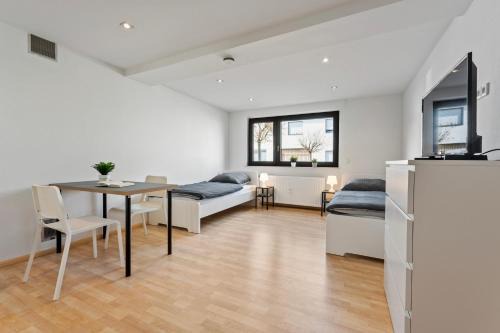 Hockenheim Apartment | Moderne Unterkunft mit Garten und Terrasse