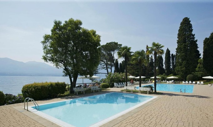 Gonte Apartment | Modernly furnished 1 room studio apartment with balcony, pool and lake access
