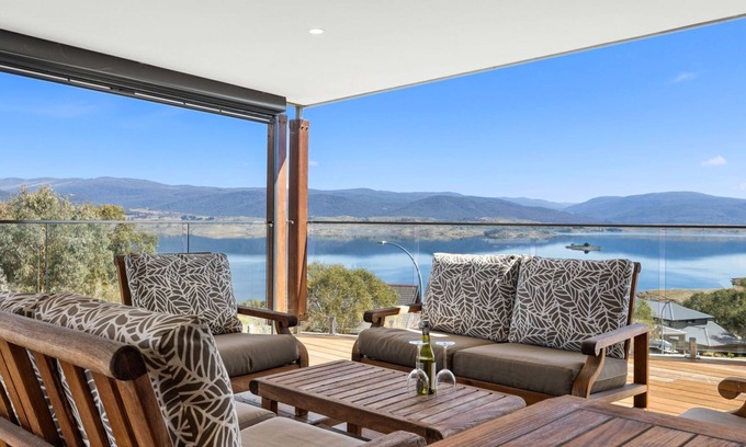 East Jindabyne House | Moongate with beautifully styled, open plan living with panoramic views over Lake Jindabyne