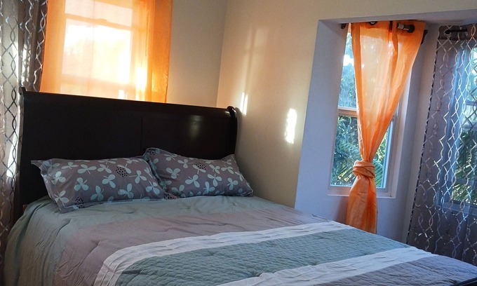 Sandy Point Town House | Mountain and Sea View Stay