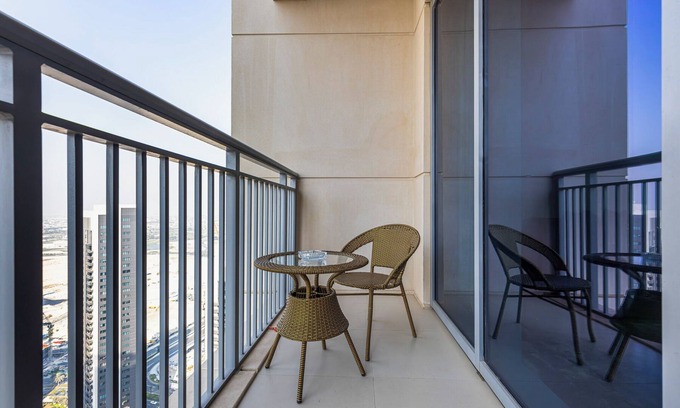 Jadaf Apartment | MyDuomo: 1BR on high floor, with park & water views