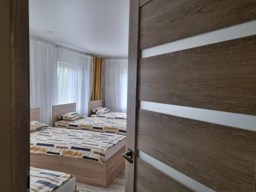 Siauliai County Apartment | Nakvynė Akmenėje -Pušyno pašonėje-