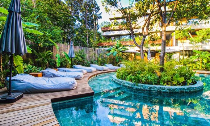 Zama Apartment | Nature-inspired studio with balcony, kitchenette, & pools - near beach