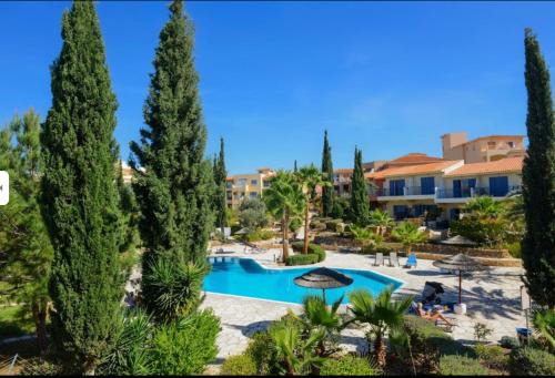 Paphos Villa | New cozy Villa near the beaches in the Magnificent Gardens of Regina with swimming pools!