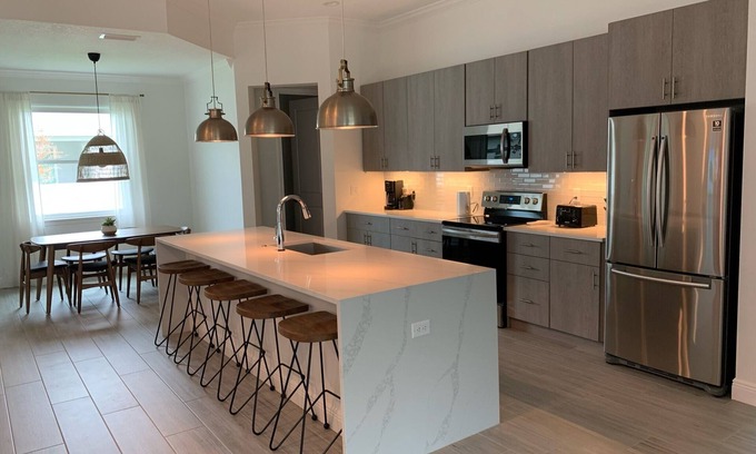 Osprey House | New Custom Smart Home Sarasota Family Getaway