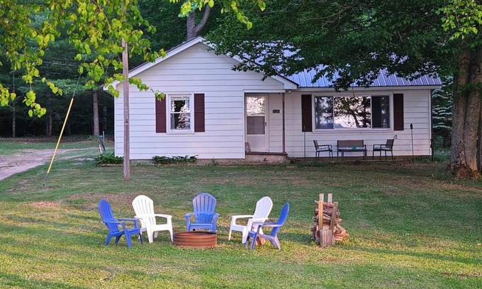 Kalkaska Cottage | New! Forrest’s Cabin - Lakefront with Sunset Views and Private Dock!