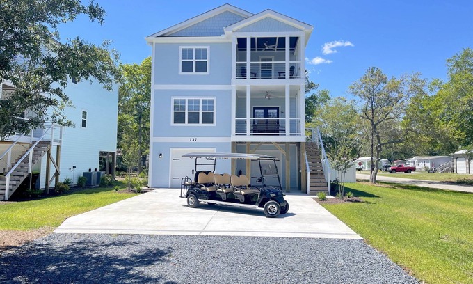 Tranquil Harbour House | New gorgeous home with Pool, New 8 seater Golf Cart, elevator, with easy access to beach