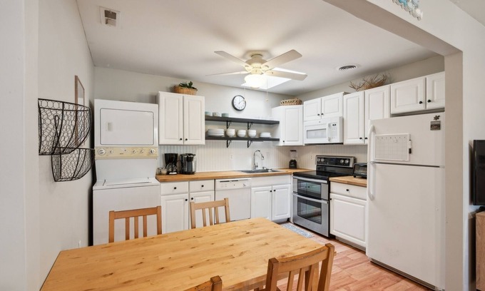 Village Green Condo | NEW LISTING! Cozy 2BR Condo - Beachside Bliss with Yard Space