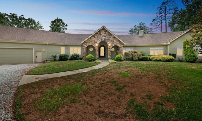 Sandston House | NEW LISTING! Hidden Waterfront Luxury Oasis with 9-Acre Pond by RedAwning