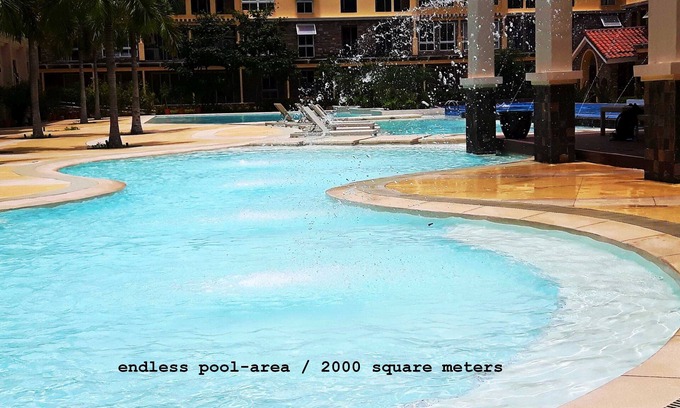 Cebu Condo | New Lux. 2 BR-condo near SM Seaside Mall - Huge Pools, Gym, Tours, Netflix