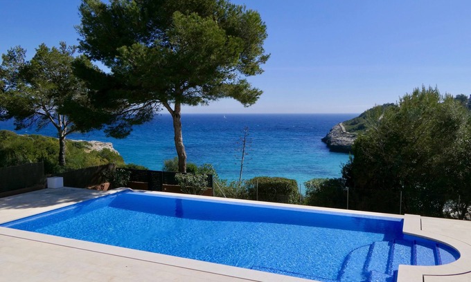 Cala Mandia Villa | New Luxury Villa, 1st Line Sea and Beach, Large Infinity Pool with Whirlpool .