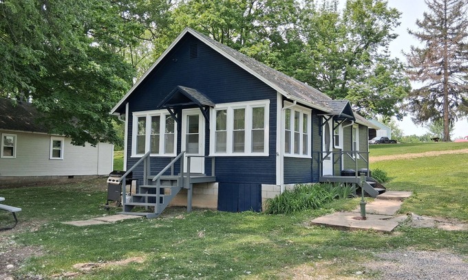 Lakeview Cottage | Newland's Resort: Cozy Channel Front Cottage #1 on Indian Lake with a boat dock