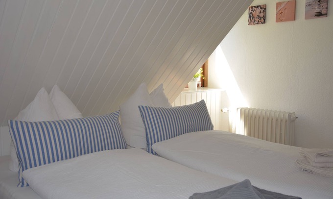 Steenodde Apartment | Newly furnished vacation apartment in direct tidal flat location with balcony and sea view.