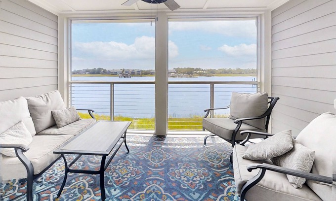 Folly Beach Condo | Newly renovated two-story waterfront condo with screened porch, pool, & tennis