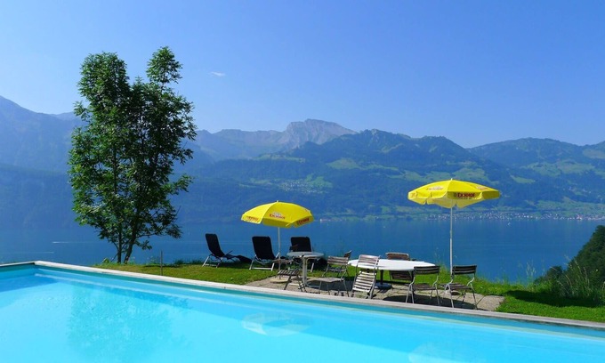 Gersau Apartment | Nice apartment for 2 guests with WIFI, pool, TV, balcony and parking