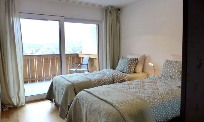 Blausee Apartment | Nice apartment for 4 people with WIFI, TV, balcony, pets allowed, panoramic view and parking