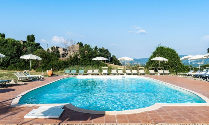 Castelnuovo di Val di Cecina Villa | Nice apartment in villa for 4 people with pool, WIFI, TV, patio and pets allowed