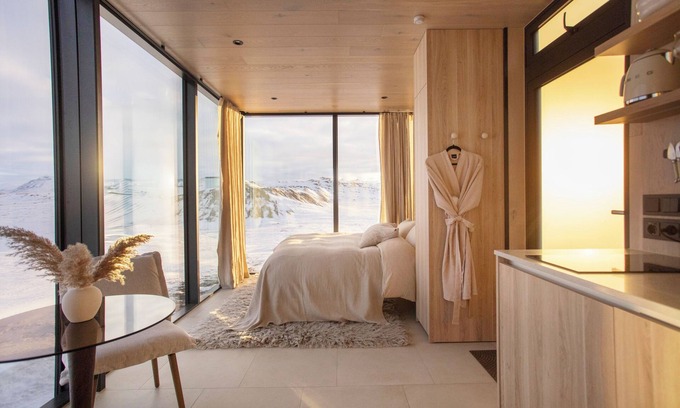 Rangarþing ytra Cabin | Northern lights galore! AURA Retreat Iceland - LOGN Cabin w hot tub & sauna.