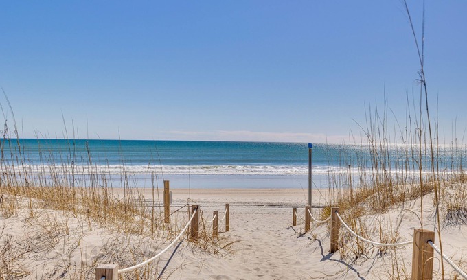 Emerald Isle Apartment | Ocean-View Apt in Emerald Isle - Walk to Beaches!