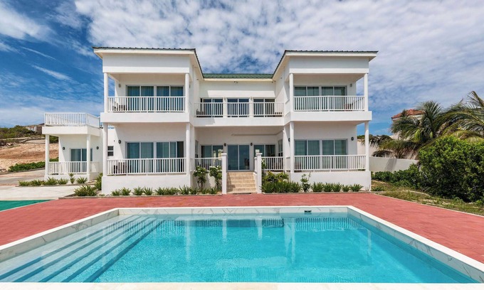 Juba Sound Apartment | Ocean Views & Pool | Near Grace Bay & Dining