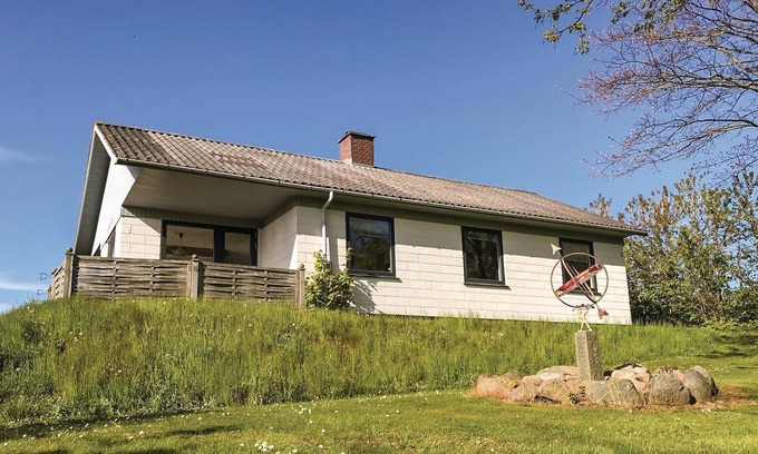 Vang House | Older vacation home, situated high above the sea and the beautiful fishing village of Vang on a beau