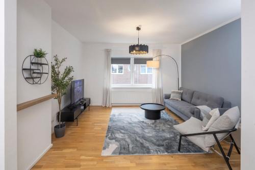 Wiesdorf Apartment | OLIVE Apartments - 2x Kingsize Betten - sehr zentral