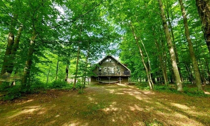 Thompsonville House | On the Betsie River, fish off dock, close to Crystal Mountain, trails, lakes!