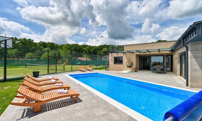 Koprivnica House | On the outskirts of Koprivnica is this modern vacation home with swimming pool and indoor spa area.