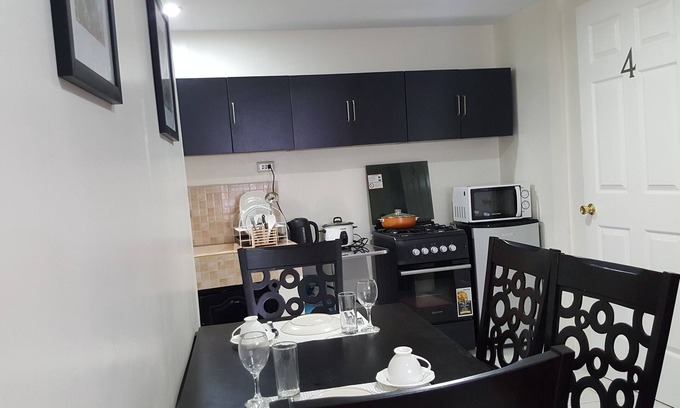 Puerto Princesa City Centre House | One Bedroom village House Close to Beaches