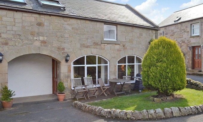 Warenford Cottage | One of five holiday homes with swimming pool, gym and tennis courts on site.