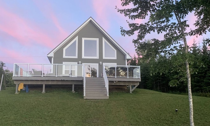 Boylston Cottage | Open and relaxing lake house, with hot tub and and firetable.