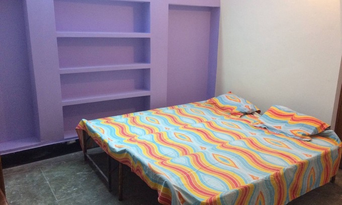 Aliganj House | Open terrace with double bedroom
