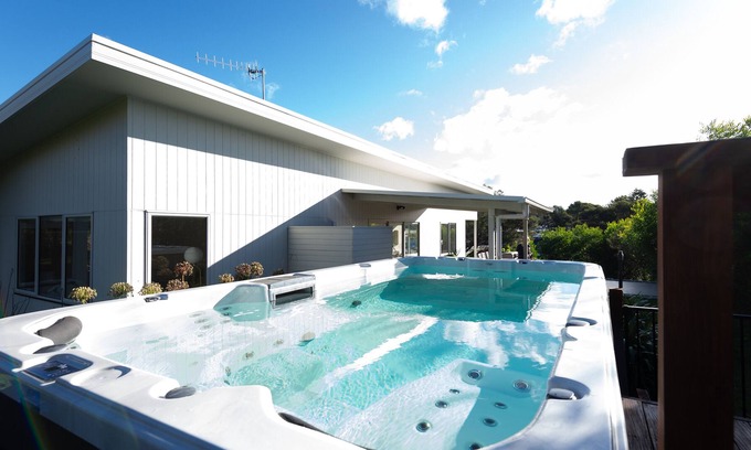 Orford House | Orford Sands: Modern beach house with huge outdoor heated swim spa