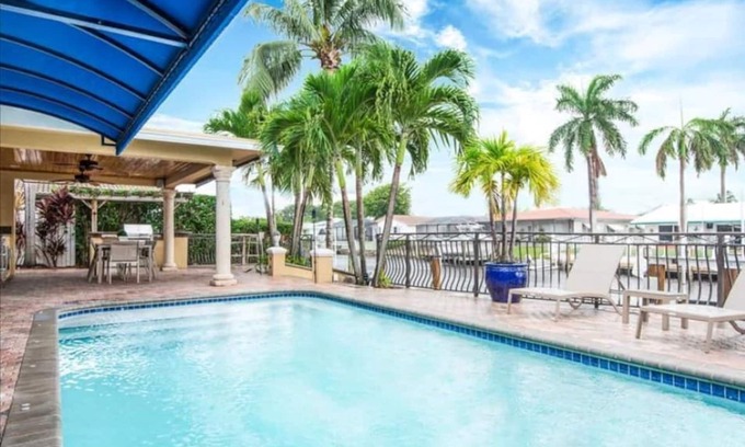 Garden Isles House | Palm Villa: New Remodel/Waterfront/Salt Water Pool!