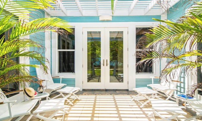 West Bay House | Papaya Cottage: 2-Bedroom Cottage on Oceanfront Micro-Resort 10 Minutes from Sev