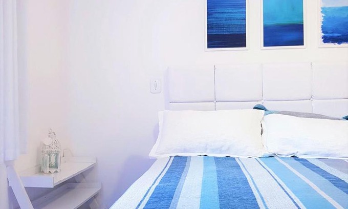 Jardim Centenario Apartment | Paraiso no Guarujá Enseada - Piscina - Ar Condicionado - WIFI - Garagem