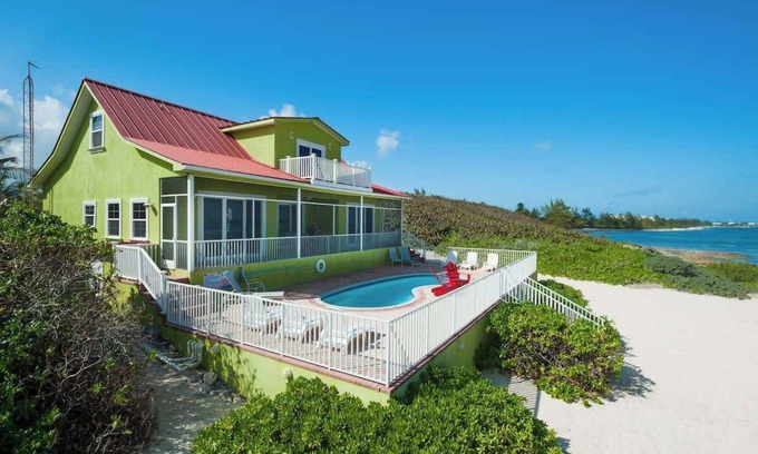 North Side House | Parrot-ise 4 Bedroom Oceanfront Villa in Cayman Kai