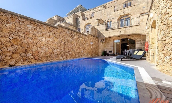 Ggantija Villa | Peaceful Farmhouse Retreat with Pool & Sun Lounger