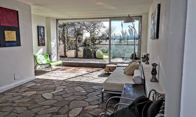 Tor di Quinto Apartment | Penthouse in picturesque Fleming where the sky merges with the beauty of Rome.
