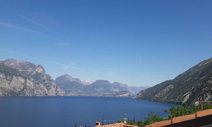 Navene Apartment | Penthouse with terrace overlooking Lake Garda in Malcesine (VR)
