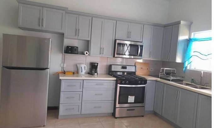 Sandy Point Town House | Periwinkles Cozy Retreat
