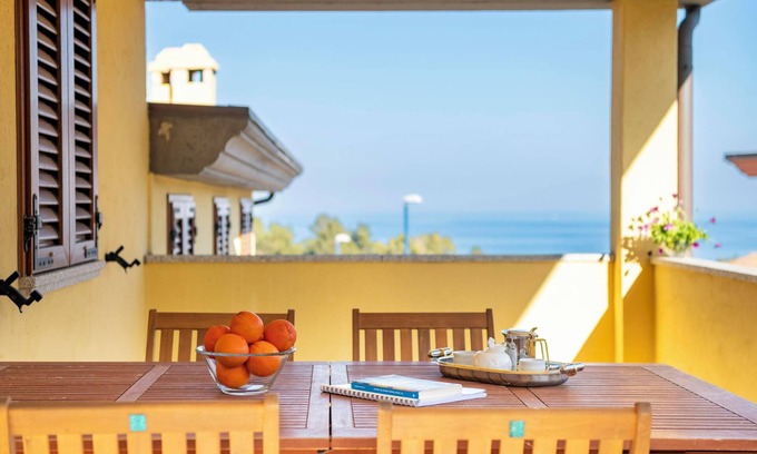 Cala Gonone Apartment | Pet Friendly Apartment 'Casa con vista mare e monti' with Sea View, Terrace & Wi-Fi